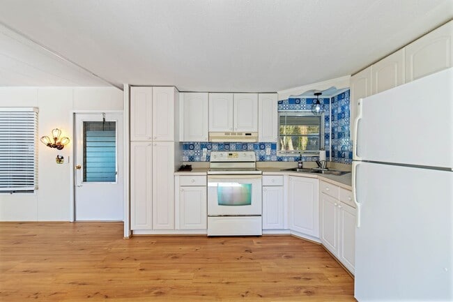 Building Photo - Charming 2BR/2BA Waterfront Home for Rent ...