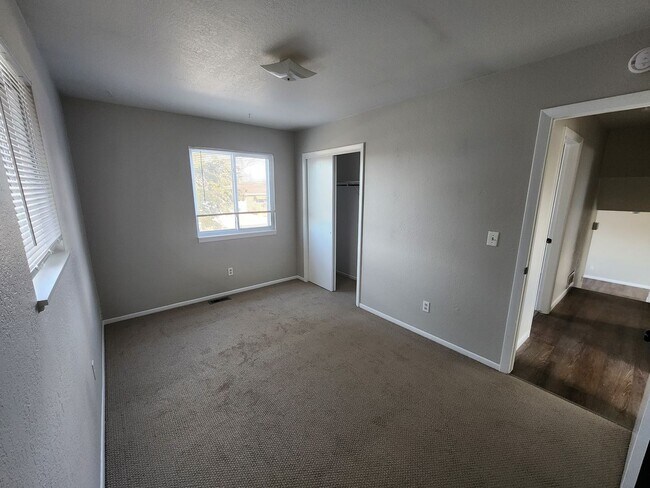 Building Photo - Shop-Ready 4BR Home with Lift-Ready Detached Garage & RV Parking Near Downtown Firestone