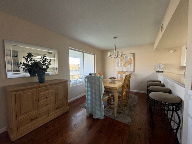 Building Photo - Riverfront 2BR 2BA Furnished Condo on GROUND LEVEL W/Garage and UTILITIES Included AVAIL 4/1/26