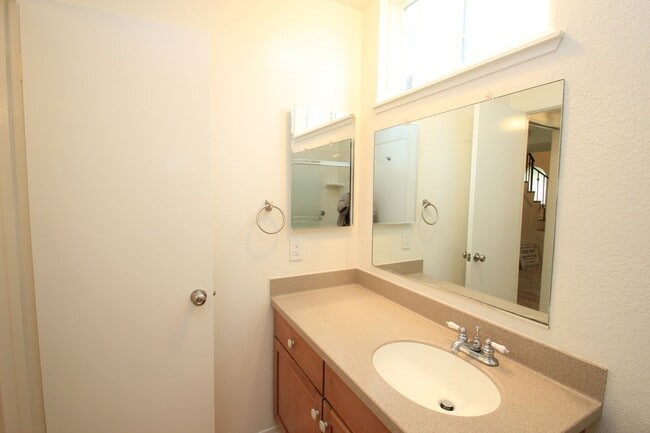 Building Photo - Welcome to this beautifully refreshed 4-bedroom, 2-bath two-story home located in desirable North...