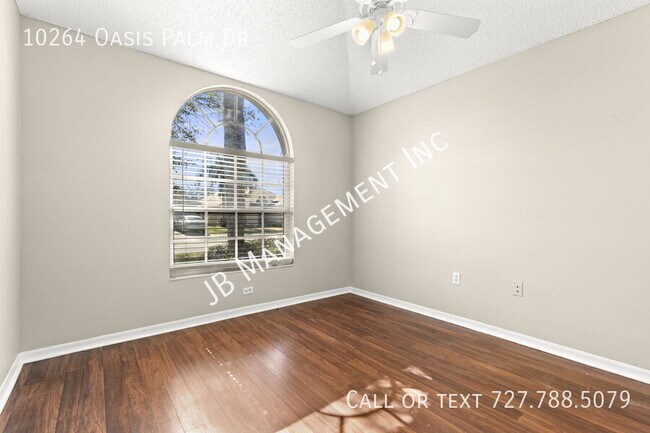 Building Photo - 10264 Oasis Palm Dr