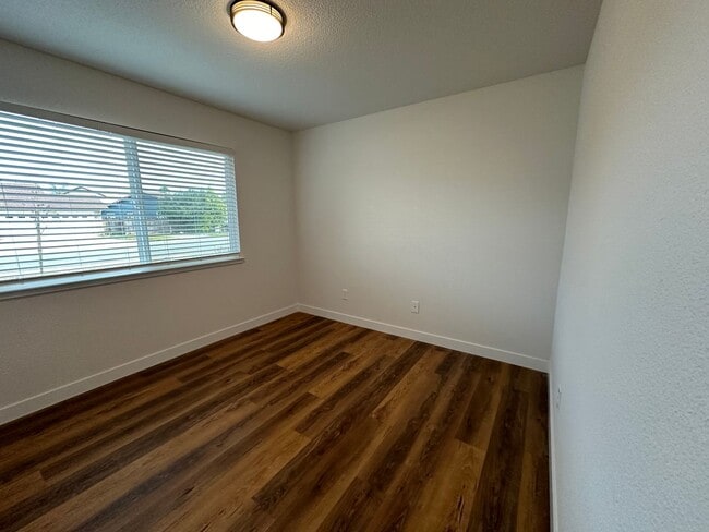 Building Photo - Updated Home with Island Kitchen, LVP Flooring, and Yard Care Included!