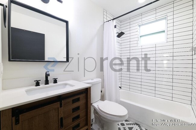 Building Photo - 3002 N Highland Ave