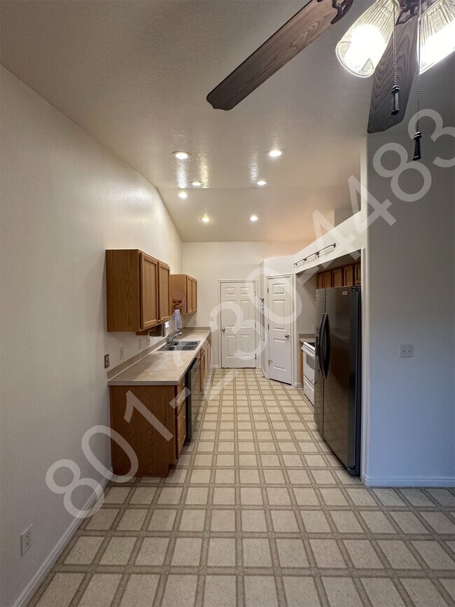 Kitchen leading to the garage - 2063 Boysenberry Dr