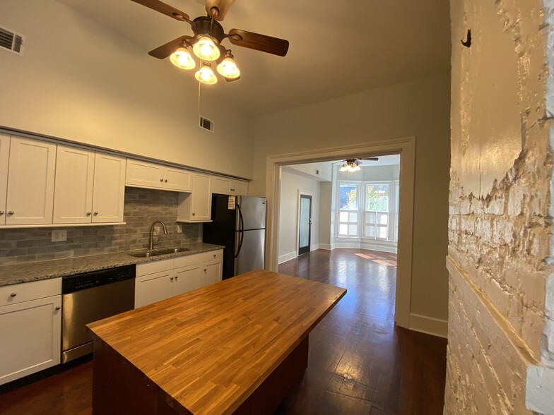 Kitchen with living room view - 120 W Duffy St