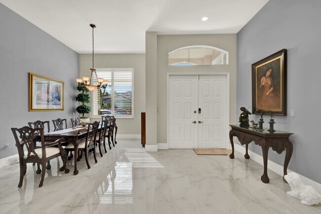Building Photo - Elegant 4-Bedroom Pool Home in Exclusive G...