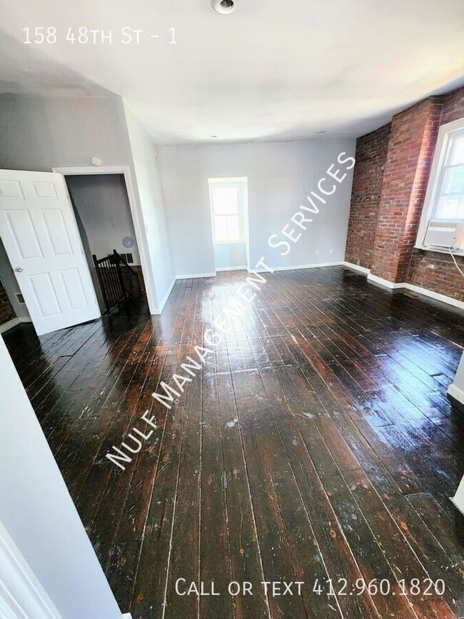 Building Photo - 158 48th St
