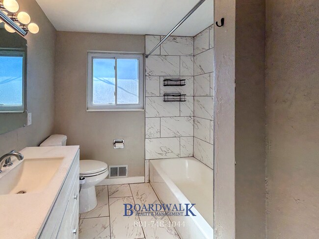 Building Photo - Spacious 4-Bed Home with In-Law
