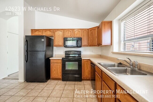 Building Photo - 42623 W Michaels Dr