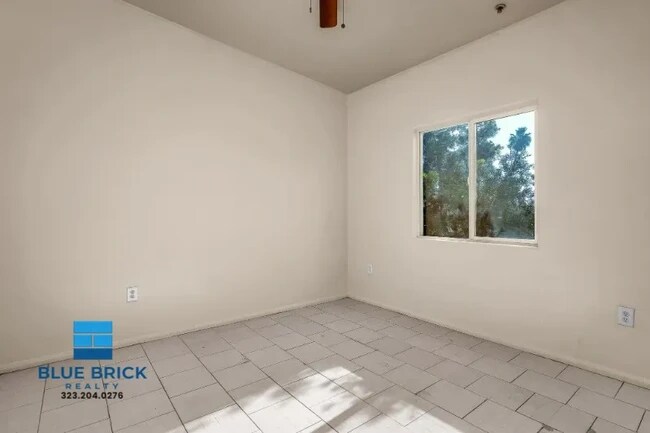 Building Photo - 5869 S Figueroa St