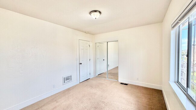 Building Photo - Beautiful Craftsman-style Home with fenced yard space, detached garage and additional parking in ...