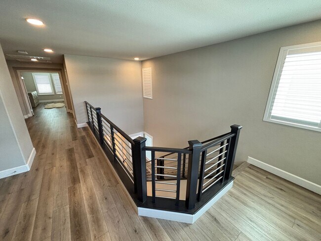 Building Photo - Contemporary 4Bed/3Bath/3 Car/+ Loft -residence located in the Silverado Ranch area