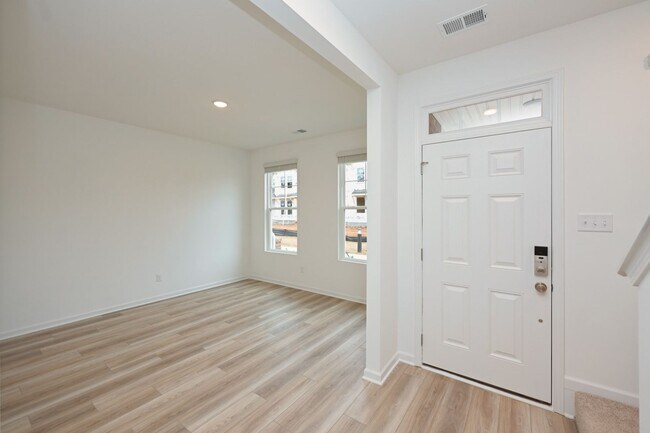 Building Photo - **BE THE LUCKY ONE TO LIVE IN THIS 2024-BUILT BRICK TOWNHOME IN THE VILLAS AT REGAL SQUARE FEATUR...