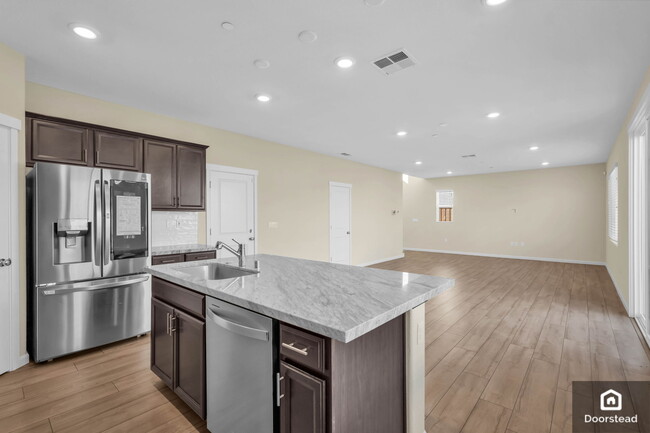 Building Photo - 5587 Saddle Rock Ln
