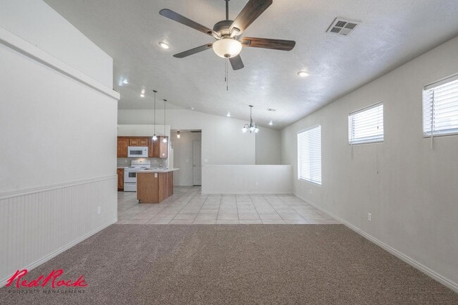 Building Photo - Fresh Carpet! Spacious 5-Bedroom Townhome