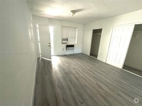 Building Photo - 720 NW 27th Ct