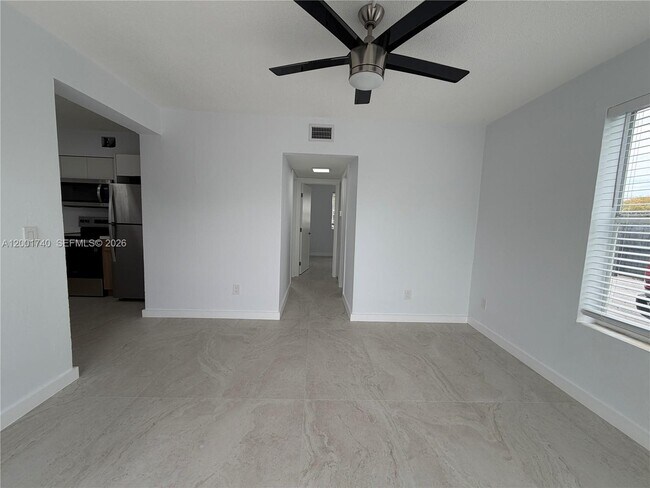 Building Photo - 5990 NE 4th Ct