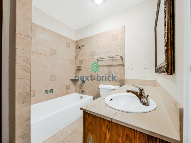 Building Photo - Charming 2 Beds and 1 Bath Condo Available...