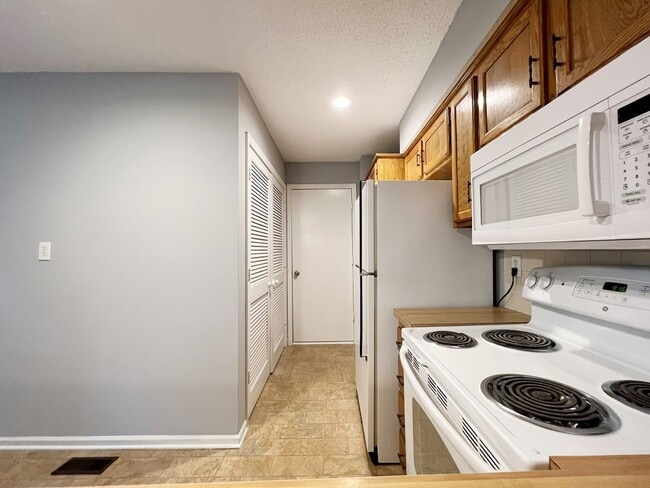 Building Photo - SEE IT NOW: Charming and Well-Maintained H...