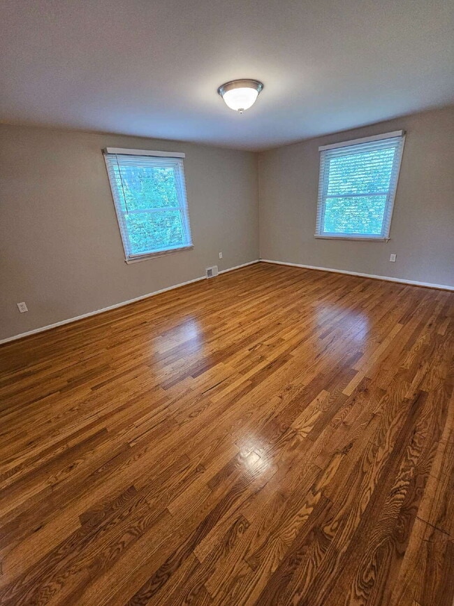 Building Photo - Private 4 Bedroom Home on 0.75 Acres with Great Room Fireplace, Wet Bar & 3-Season Room, 2 Car At...