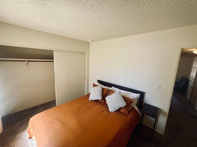 Building Photo - Affordable Comfort in 55+ Guard-Gated Comm...