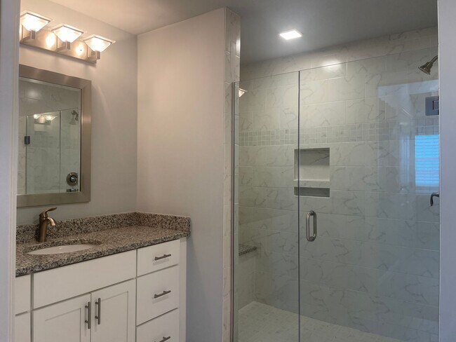Building Photo - Coastal Luxury at Hidden Bay | 3BR Waterfront Condo with Bay Views
