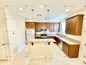 Building Photo - Luxury and Convenience Fully Equipped 3-Bedroom 2.5 Bathroom 2 Car Garage Townhome in Carson City