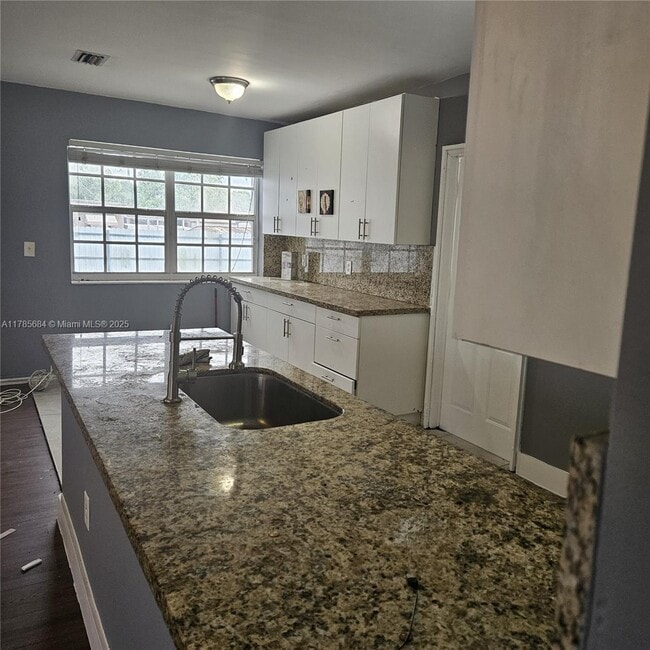 Building Photo - 16115 NW 42nd Ave
