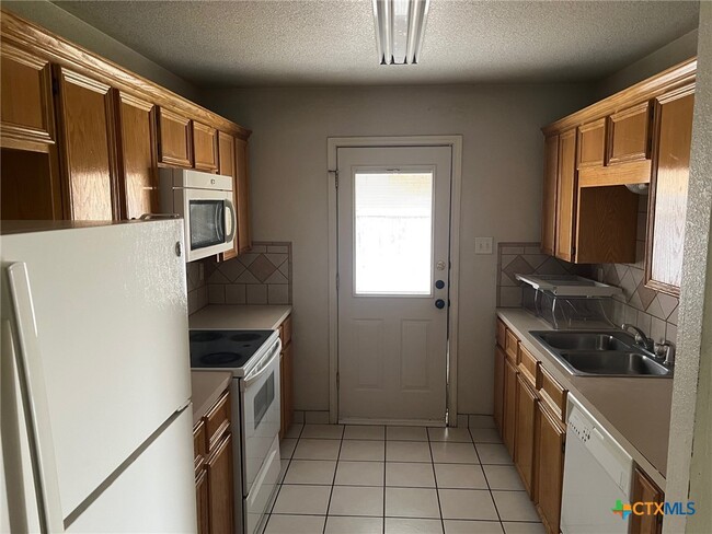 Building Photo - 1809 N W S Young Dr