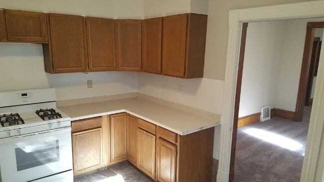 Building Photo - Charming 1-Bedroom Retreat on Colfax Ave – Your Cozy Minneapolis Haven Awaits!