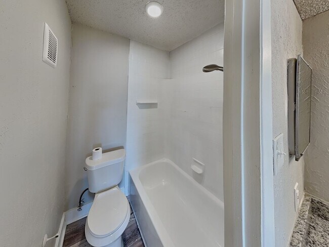 Building Photo - Stylish Upstairs Condo with Fireplace, Private Balcony & Gated Community Perks