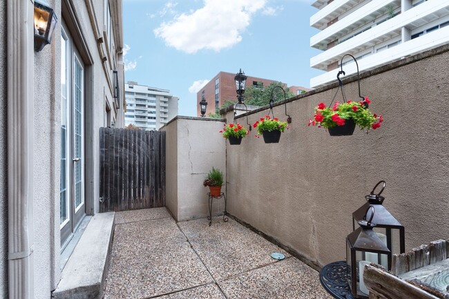 Building Photo - Gorgeous Mediterranean-style condo located...