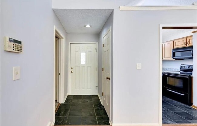 Building Photo - SEE IT NOW: Charming 2-Bedroom Condo in a ...