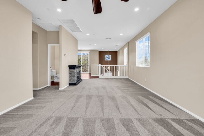 Building Photo - Modern, Guard Gated, and Close to Everything! 3-Bed Townhome Near St. Rose Parkway and Liberty Hi...