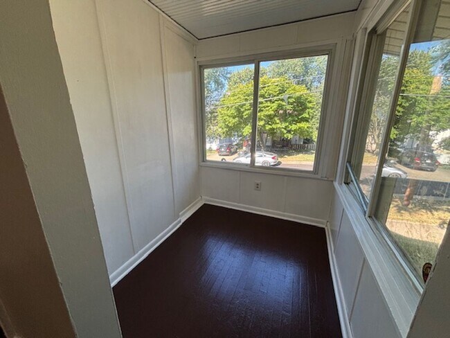 Building Photo - Classic 1928 Goodyear Heights charmer—fireplace, yard & off-street parking