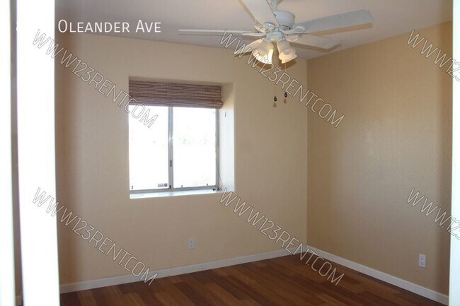 Building Photo - 8636 Oleander Ave