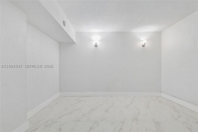 Building Photo - 19380 Collins Ave