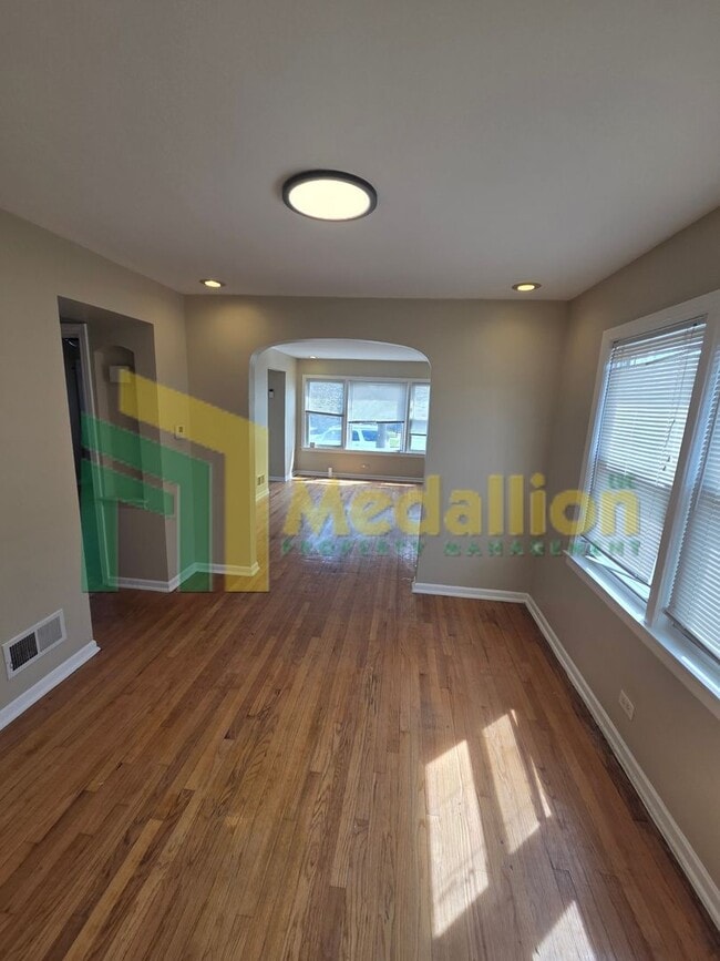 Building Photo - Spacious 4-Bedroom Home with Finished Basement and Yard Space