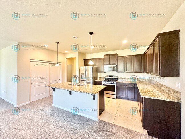 Building Photo - 3 Bedroom 2 Bathroom with Garage covered patio and beautiful yard!