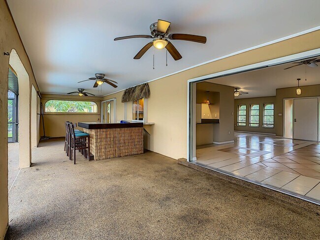Building Photo - Port Charlotte Waterfront Pool Home - Grea...