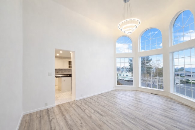 Building Photo - Executive 3 Bed Home with 3 Car Garage & Private Fenced Yard