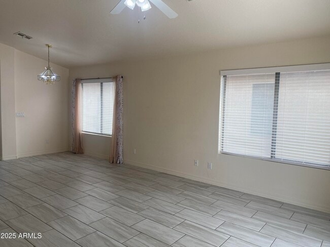 Building Photo - 8563 W Mission Ln