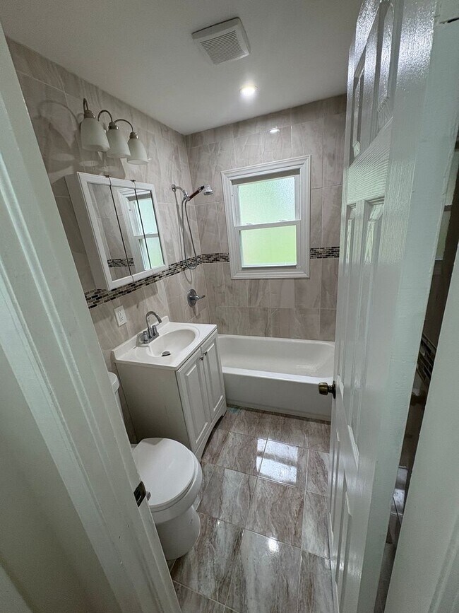 Building Photo - 3 Bedroom / 2 Bath Updated Home / Large Fenced Yard / Brand-New Multi-Level Deck