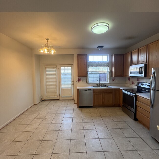 Building Photo - 6731 Stone Maple Terrace