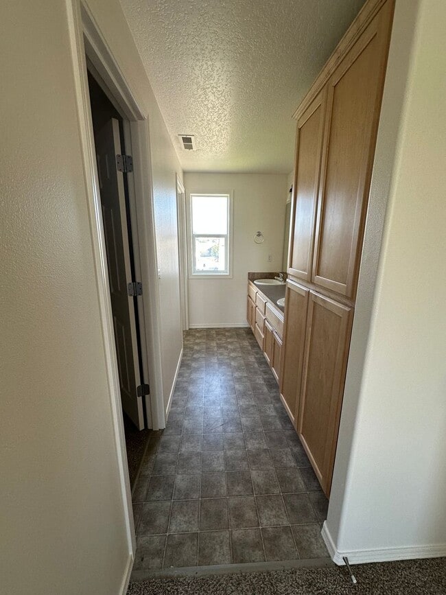 Building Photo - Spacious 4 Bedroom, 3 Bath Home with Fence...