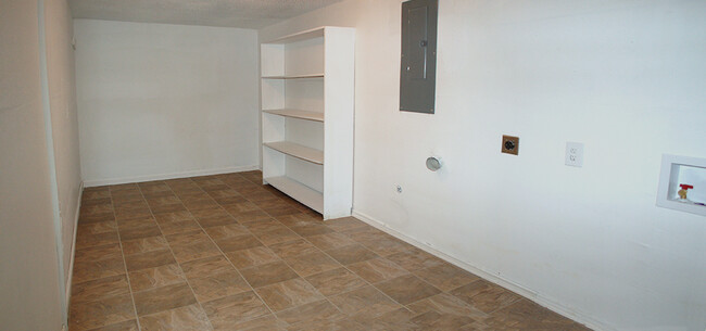 Huge laundry and storage room - 8710 Park Ln