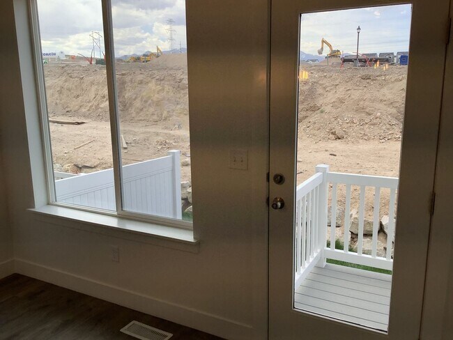 Building Photo - MAKE YOUR FIRST RENT PAYMENT UNTIL 2026-New Construction Townhome Located in Prime Saratoga Sprin...