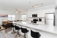 Building Photo - Furnished Luxury Condo on Riverfront Parkw...