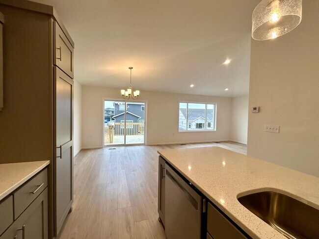 Building Photo - Spacious & Stylish 4-Bed Home with Modern Finishes and Attached 2-Stall Garage