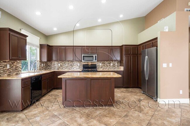 Building Photo - A Beautiful Corona Home Designed for Open Space and Comfortable Living